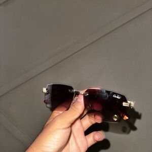 Cartier Gold and Black Rimless Sunglasses